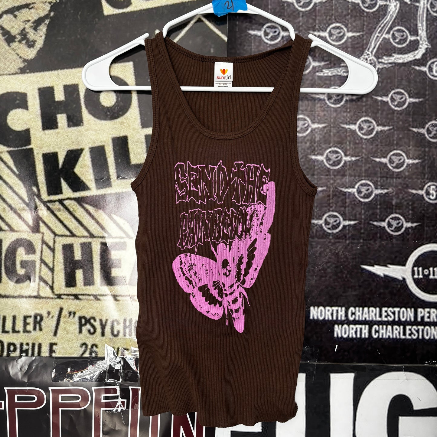 Pain below brown/pink ribbed tank