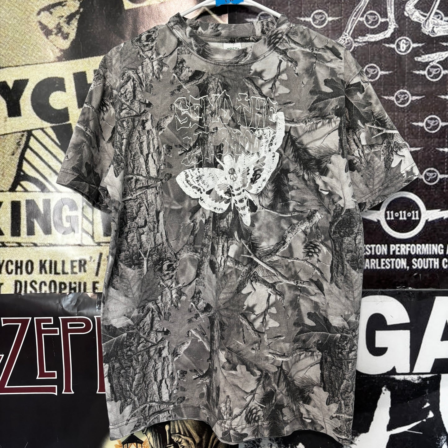 Pain below grey camo t-shirt