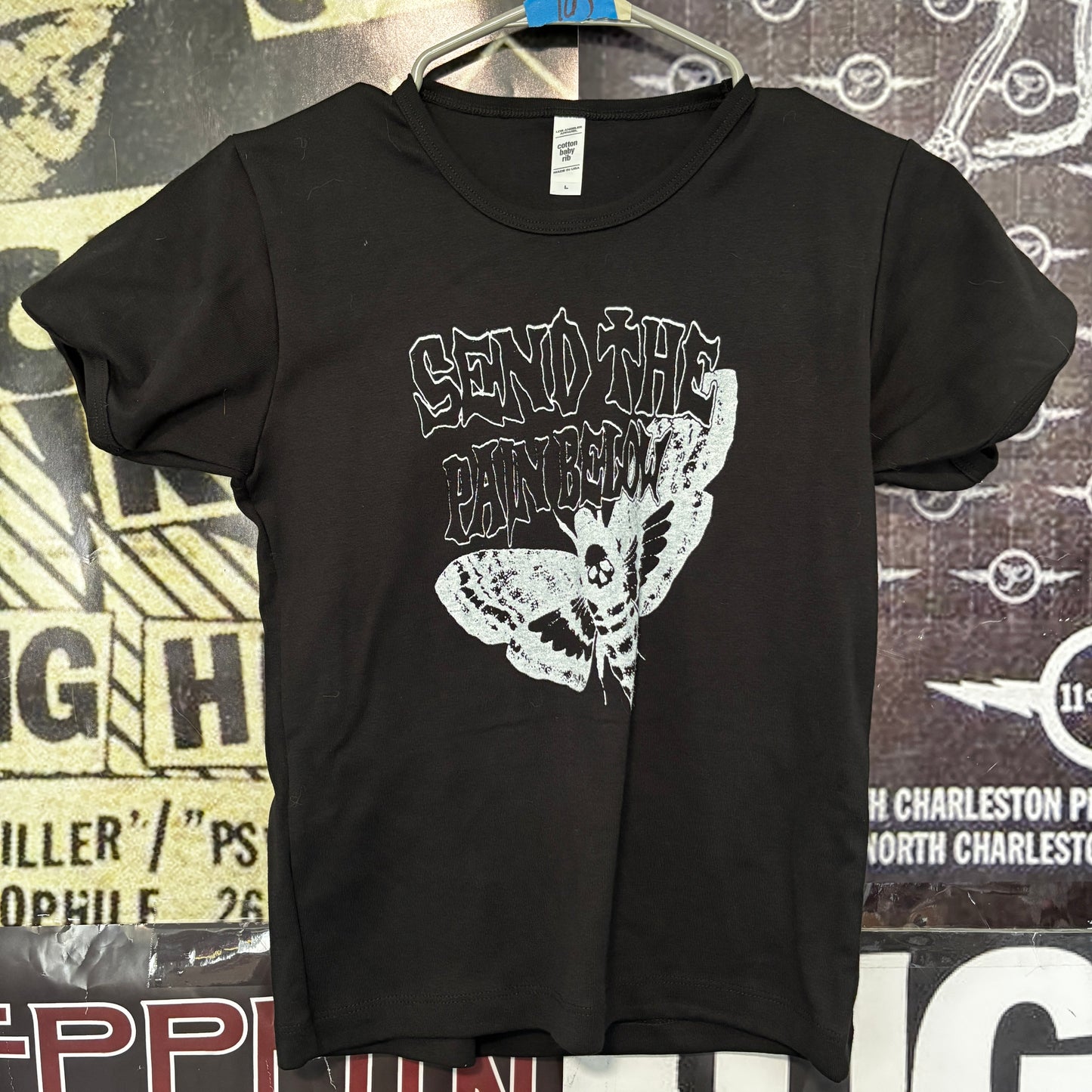 Pain below black long baby tee
