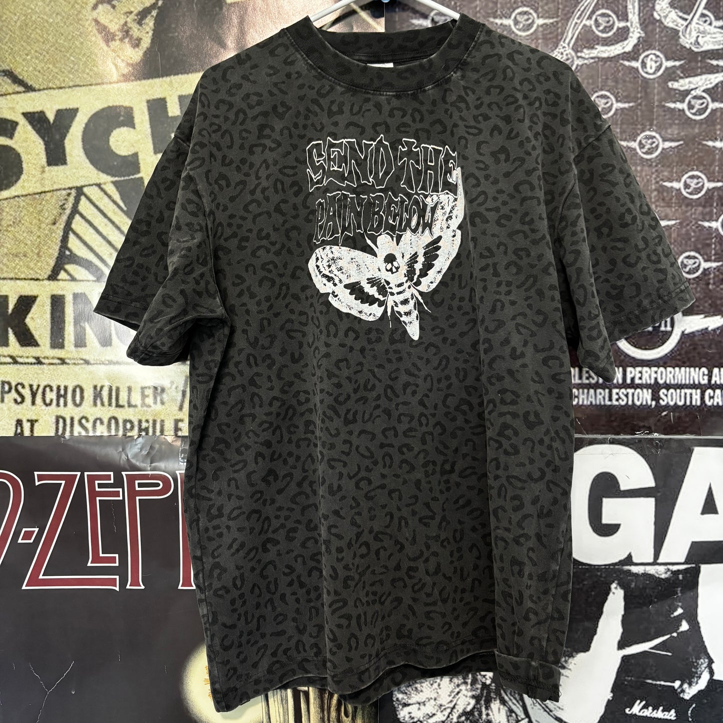 Pain below grey cheetah t-shirt