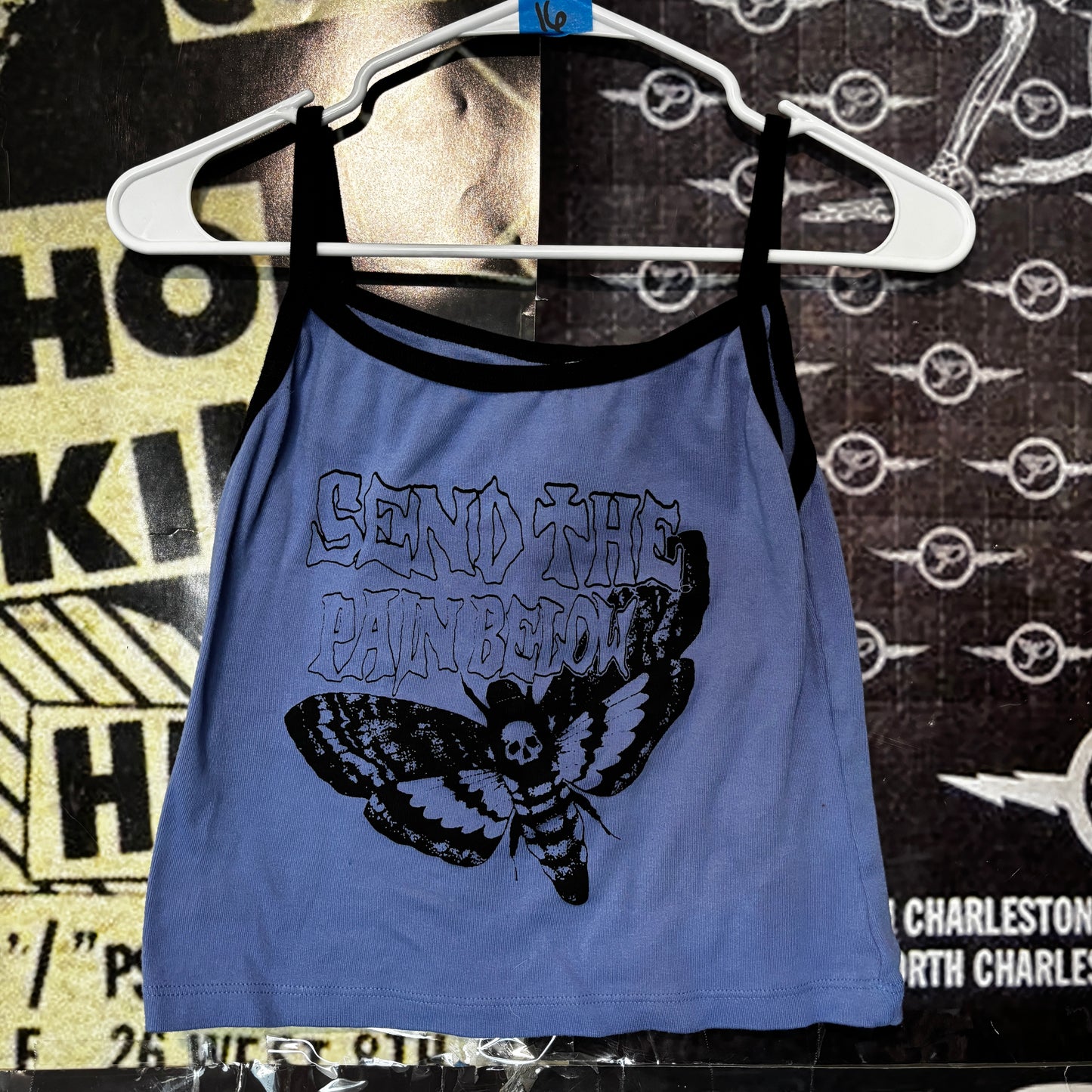 pain below blue/black baby tank