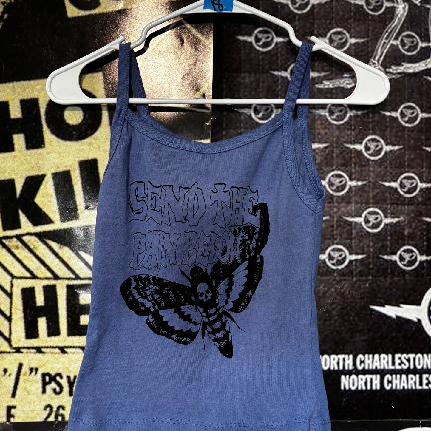 pain below blue baby tank