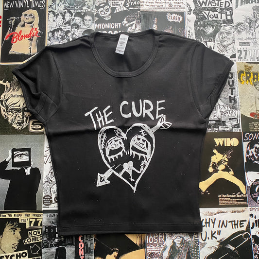 The cure heart black baby tee